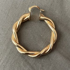 Sold 14k gold hoop earring